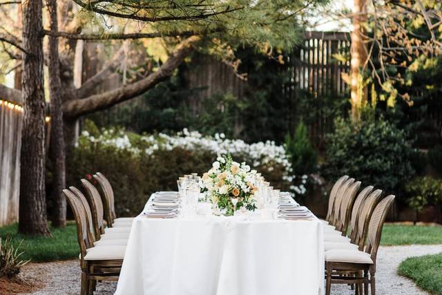 This intimate table set for twelve, styled by Ever Something Events and Floral Design. With chairs provided by