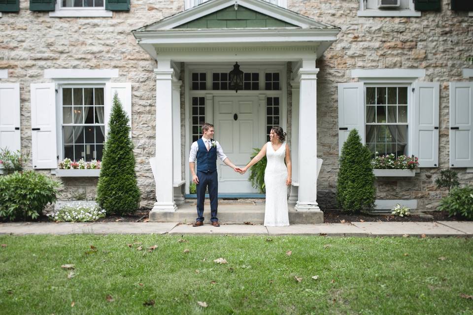 Bride & Groom in front of B&B