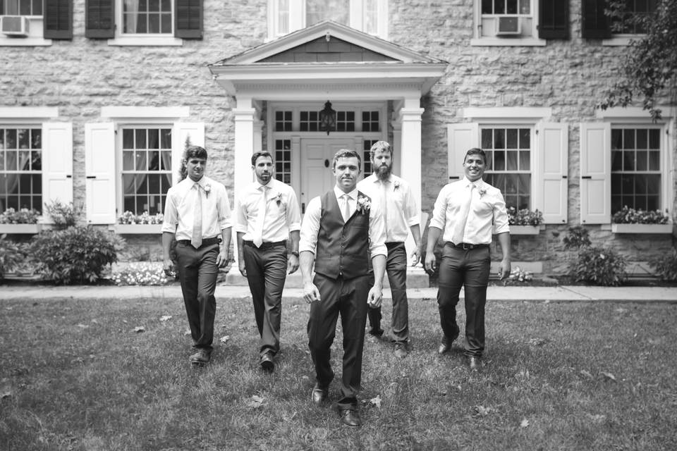 Groomsmen in front of B&B