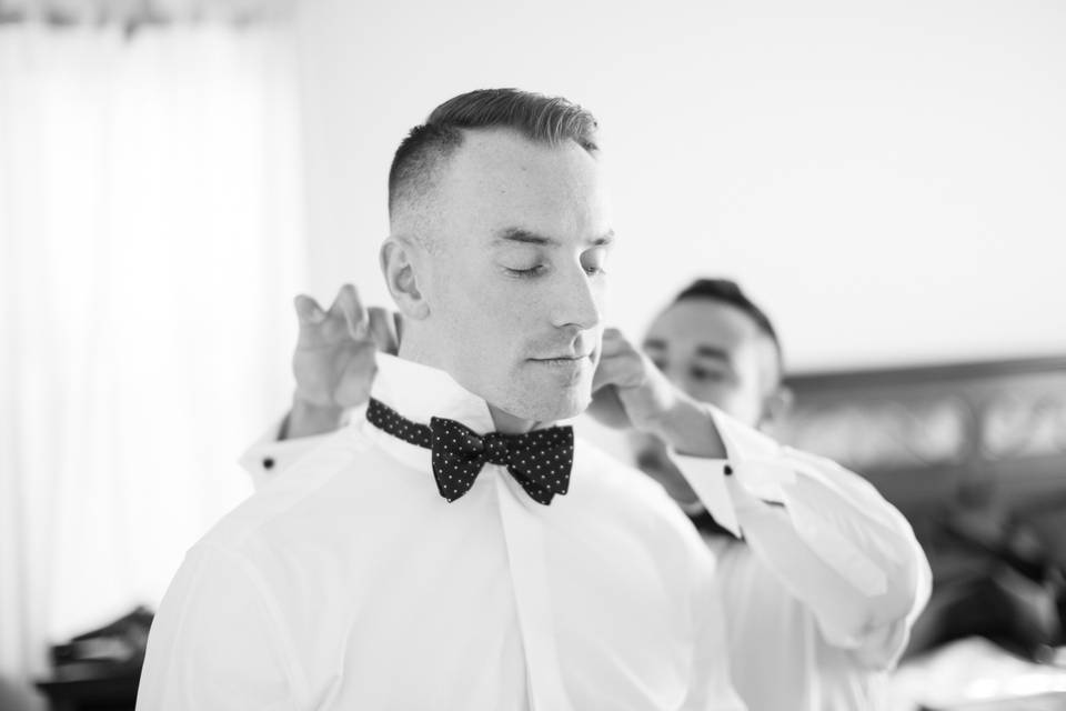 The groom getting ready