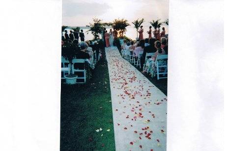 Chuppa for Jewish Wedding at the 18th Green of Harbor Town Golf Links overlooking Daufuski Island.