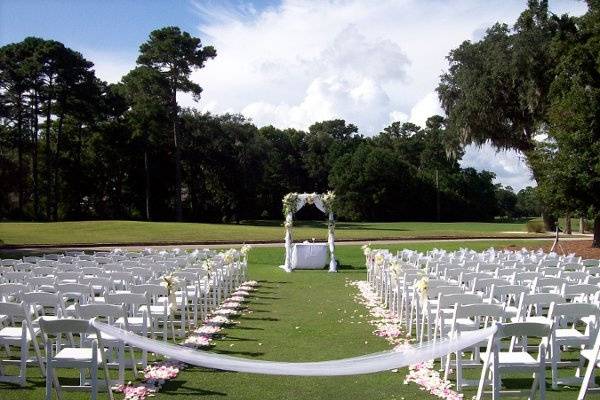 Chuppa for Jewish wedding at Indigo Run Golf Club.  Chuppa structure was provided/built by family.