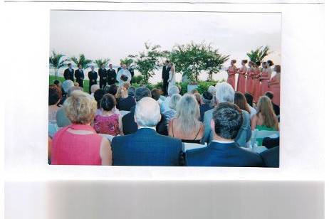 Chuppa for Jewish wedding at 18 green of Harbour Town Links.  Chuppa was designed with 8 foot crepe myrtle trees, bamboo, greenery and flowers.