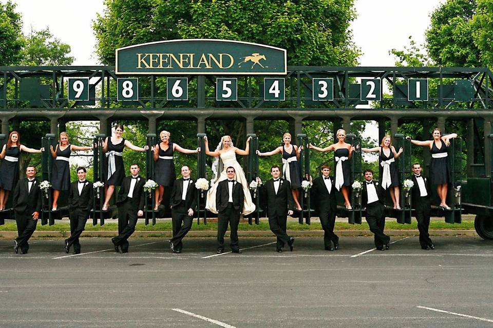 The couple with the bridesmaids and groomsmen