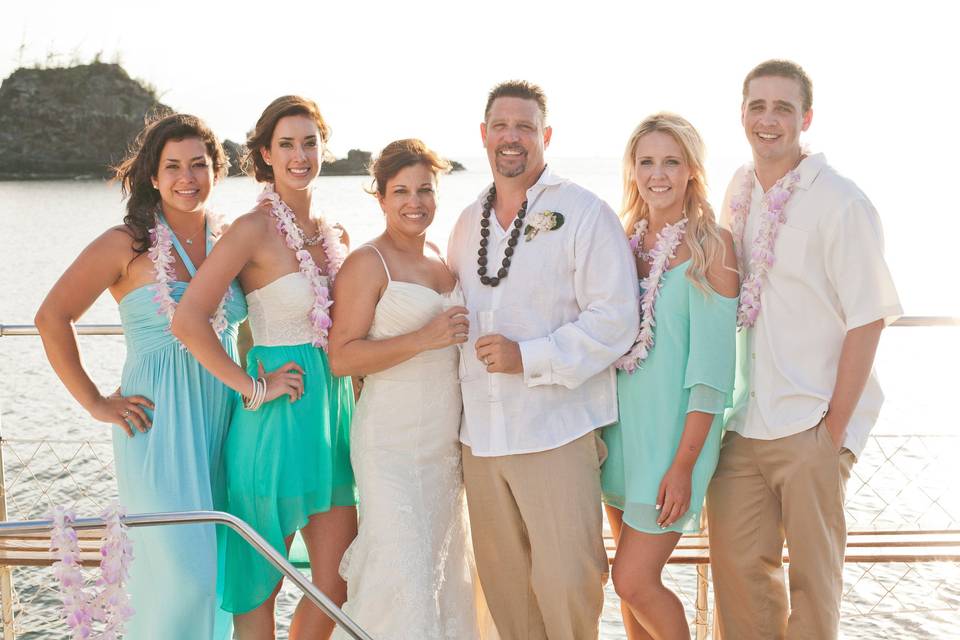 The couple with the bridesmaids and groomsmen