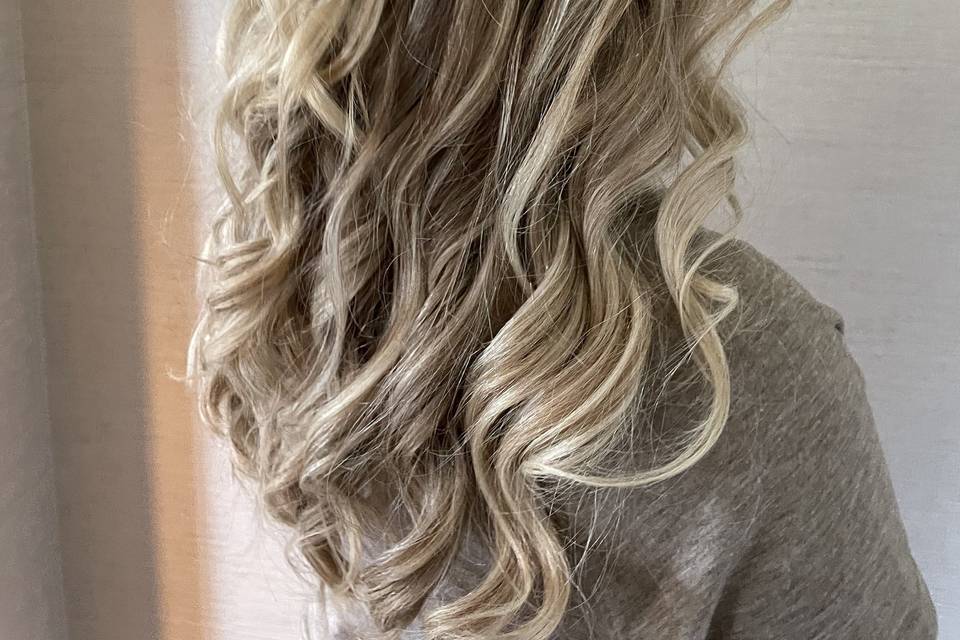 Soft, half-up textured hair