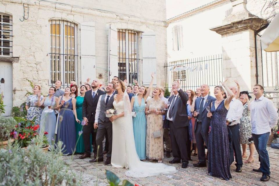 Couple with the wedding guests