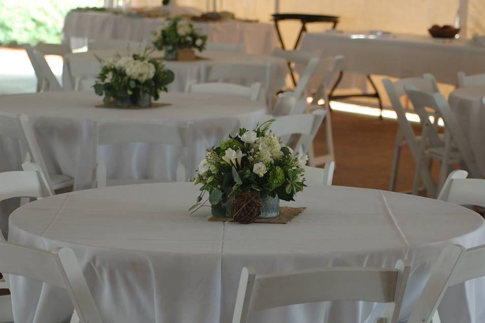 Simple & beautiful center pieces in the Garden Tent.