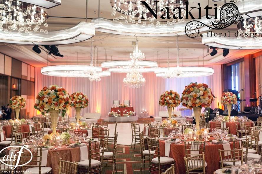 Reception hall and raised floral centerpieces