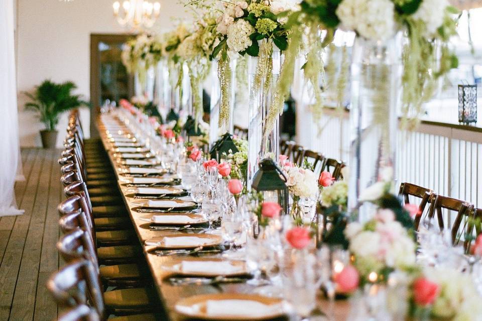 Long table setup with flowers