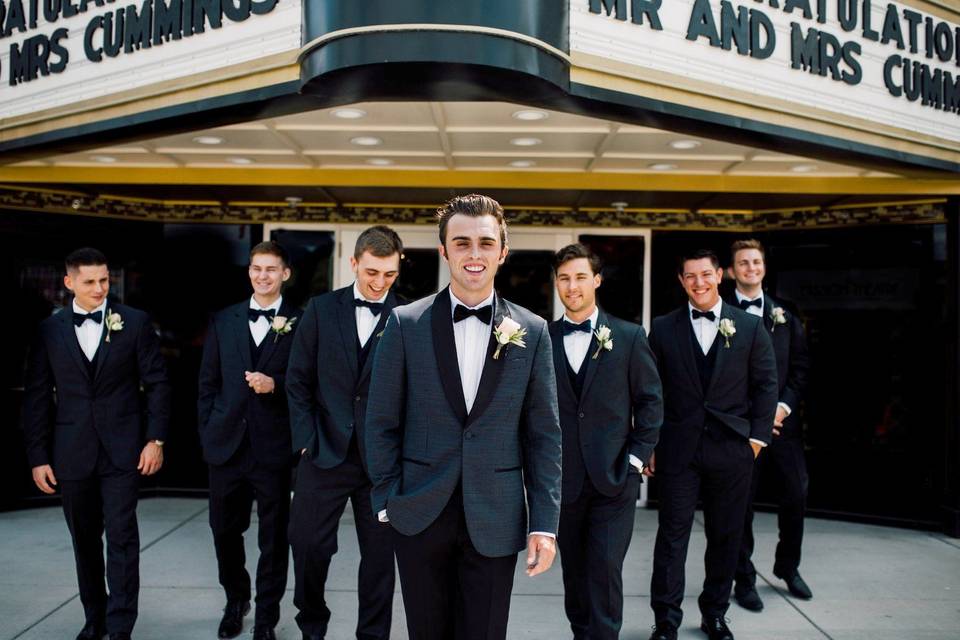 Groomsmen with custom marquee