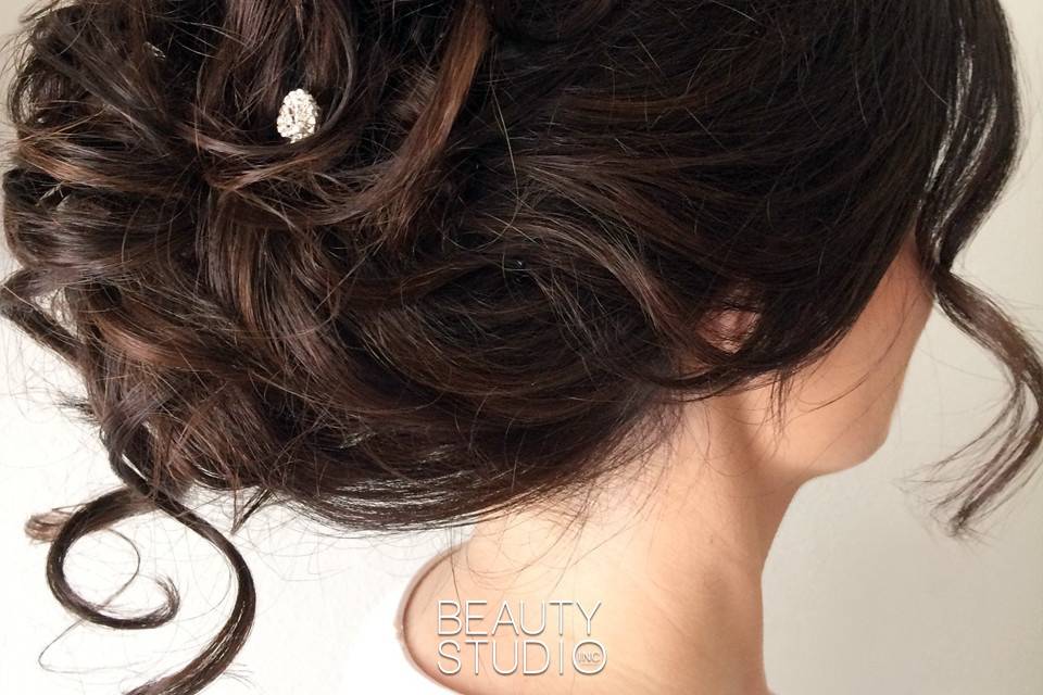 Wavy updo with silver accessories