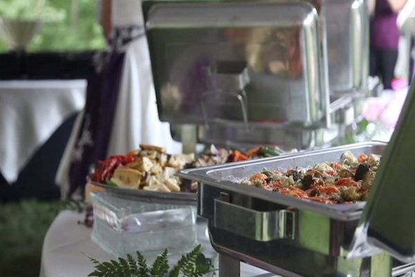 A formal buffet allows guests to choose their meal while also offering a cost savings to the bridal party.