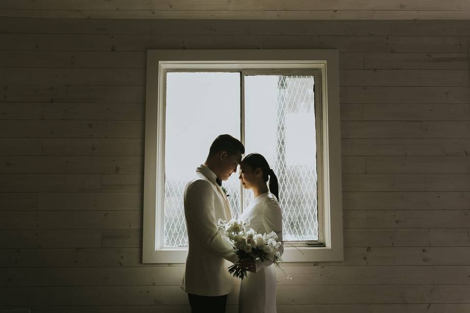 Newlyweds by the window