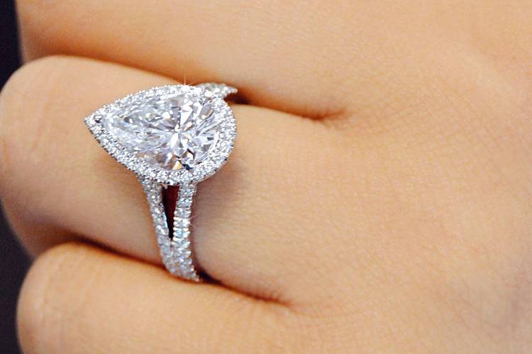 Pear shaped halo split diamond band engagement ring