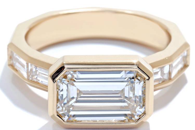 Emerald cut yellow gold ring