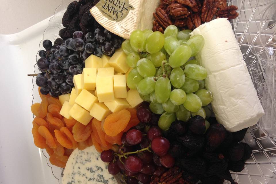 Artisan cheese platter with seasonal fruit