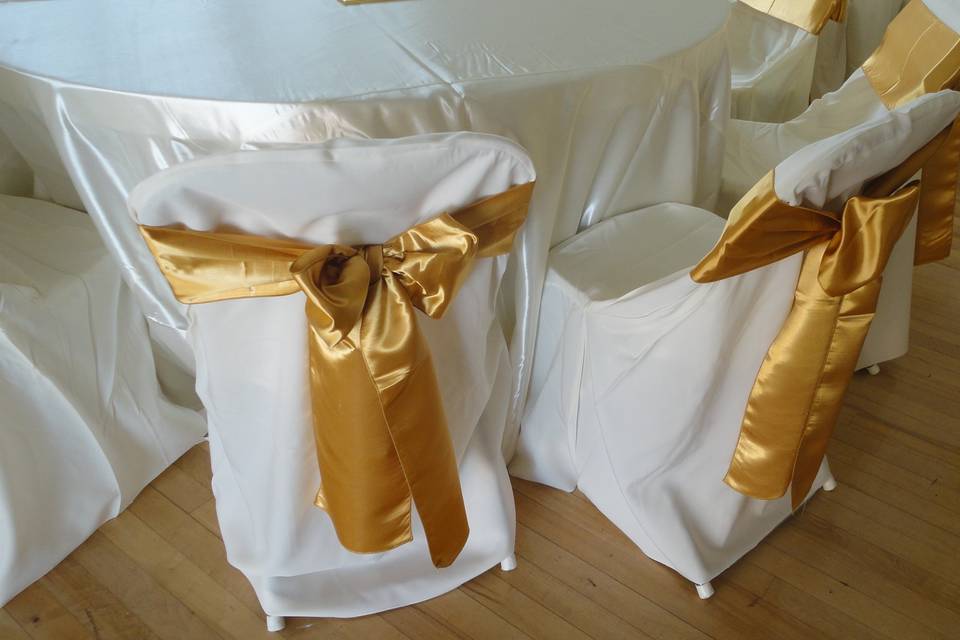 Gold chair bows