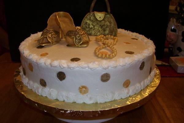 Buttercream Round Cake with Gumpaste Shoes and Handbag.
