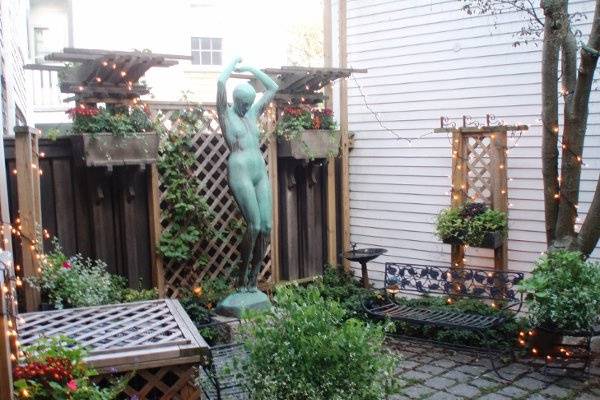 Another view of the Cirino Interlude Courtyard in Early October. Brides will sometimes place a small cocktail or champagne bar here to welcome their guests into the Reception Hall.