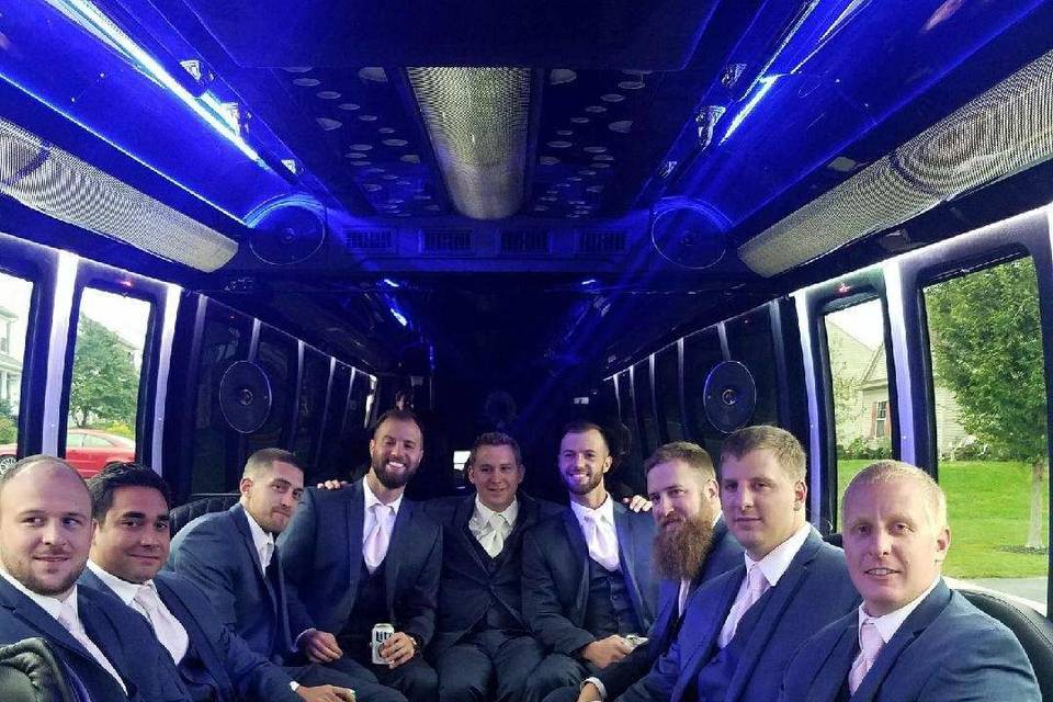 Groom and groomsmen in the limo