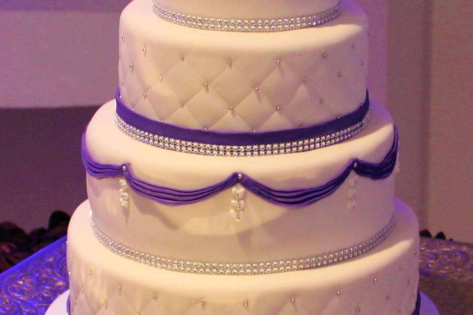 White cake with purple bands