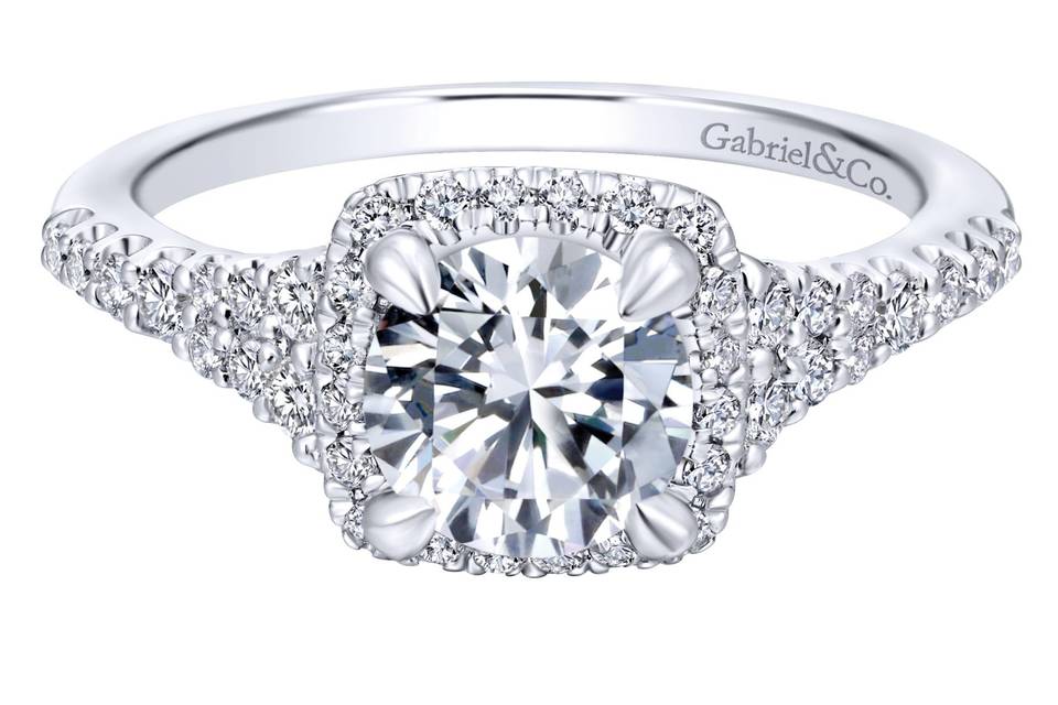 ER12670R4W44JJ	<br>	A graceful pave diamond band widens as it rises to meet a squared diamond halo in this exquisite white gold engagement ring guaranteed to make her heart flutter.