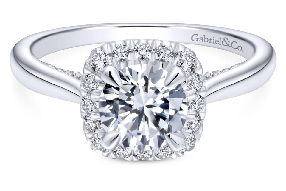 ER12672R4W44JJ	<br>	Cradle your center stone within a fiery diamond halo when you choose this chic engagement ring. The tapered band of smooth white gold conceals delicate strand of pave diamonds beneath, just for her to enjoy.