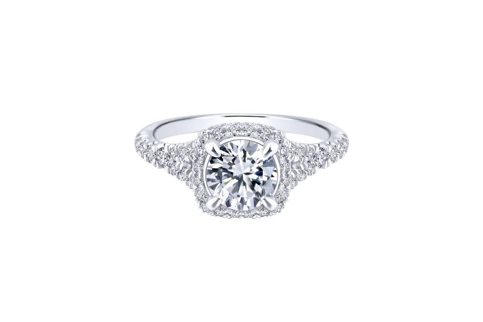 ER12813R4W44JJ	<br>	Two rows of sparkling diamonds form a multi-dimensional halo around the round cut center stone at the heart of this chic engagement ring. The white gold band, also adorned with pave diamonds, cleaves into two strands as it approaches the halo.