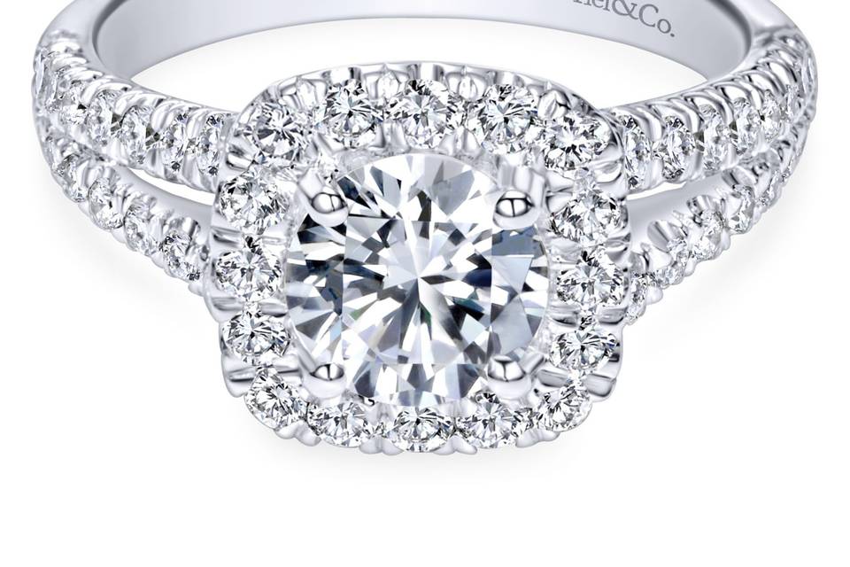 ER10252W44JJ	Delightful diamond rows split toward the lavish halo in this white gold engagement ring