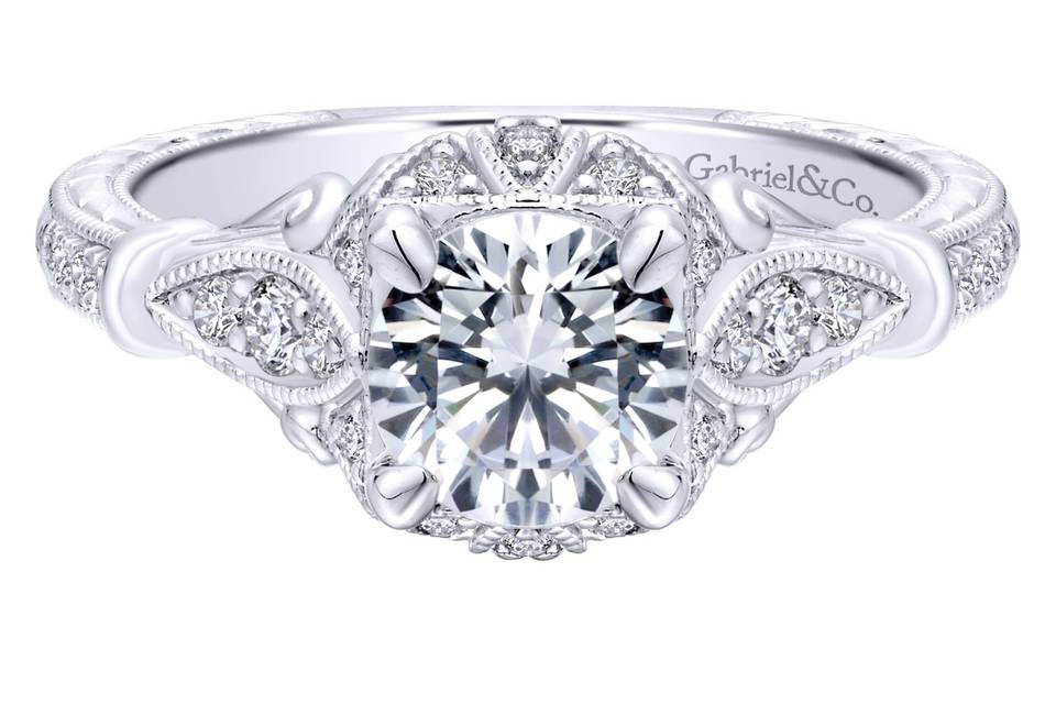 ER12581R4W44JJ	A hand etched band and exquisite detailing in this enchanting 14k white gold Empire engagement ring will forever be a treasure.