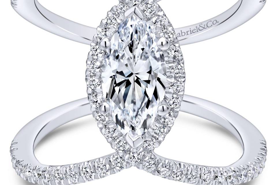 ER12644M4W44JJ	Strands of diamonds twist and turn around your precious center stone to create this dazzling setting.