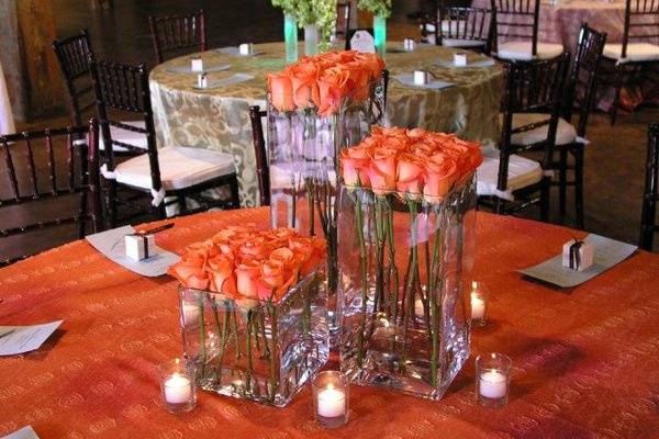 Tangerine colored rose centerpiece.
