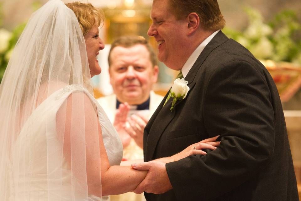 Couple with officiant