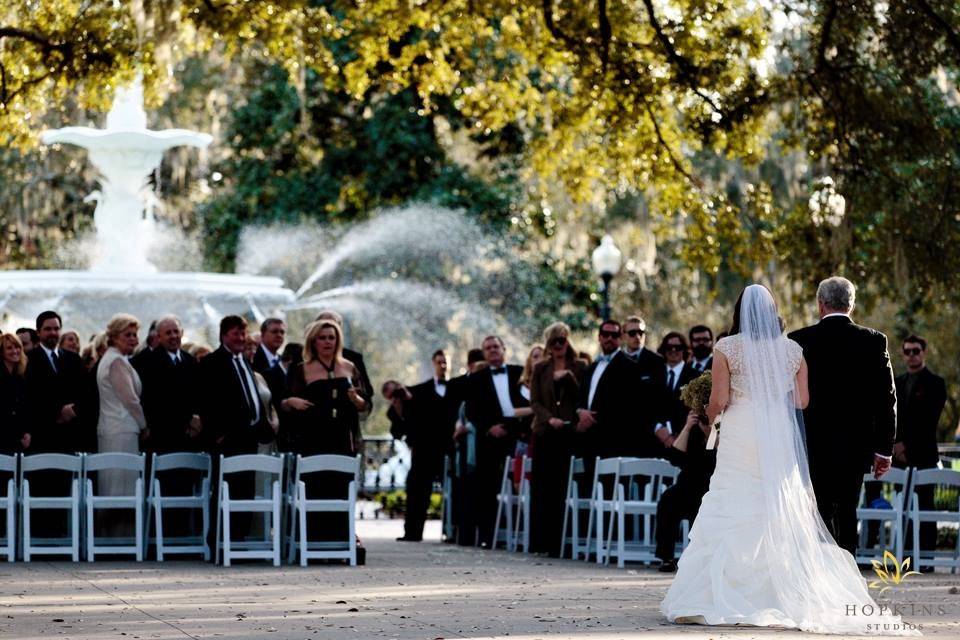 The bride walking down the aisle