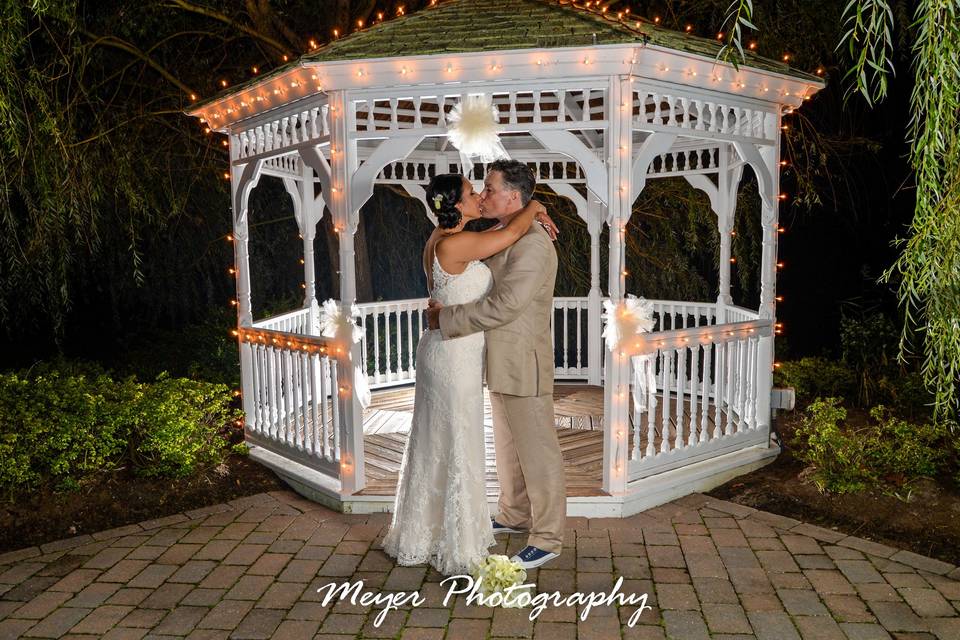 Kiss by the gazebo