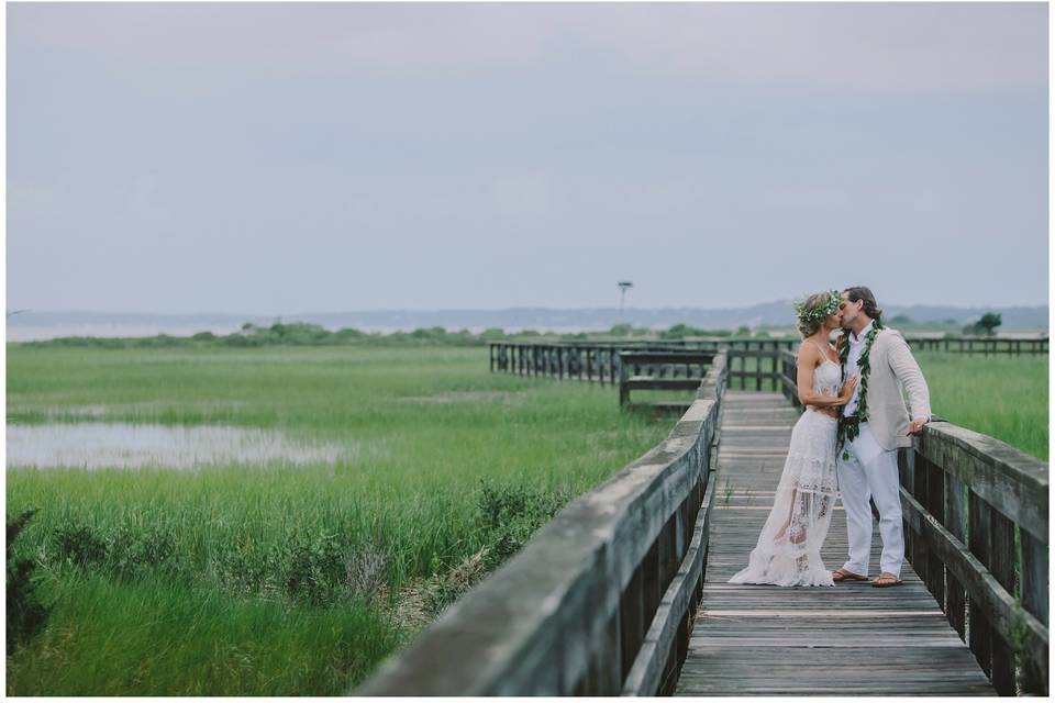 Couple kissing on pathway