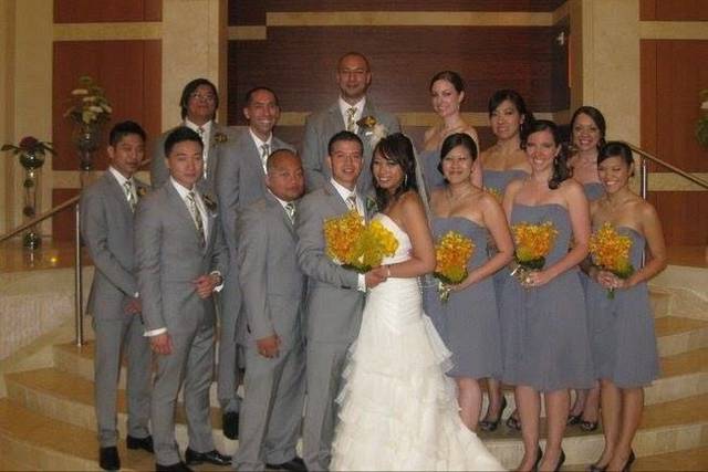 The couple with the bridesmaids and groomsmen