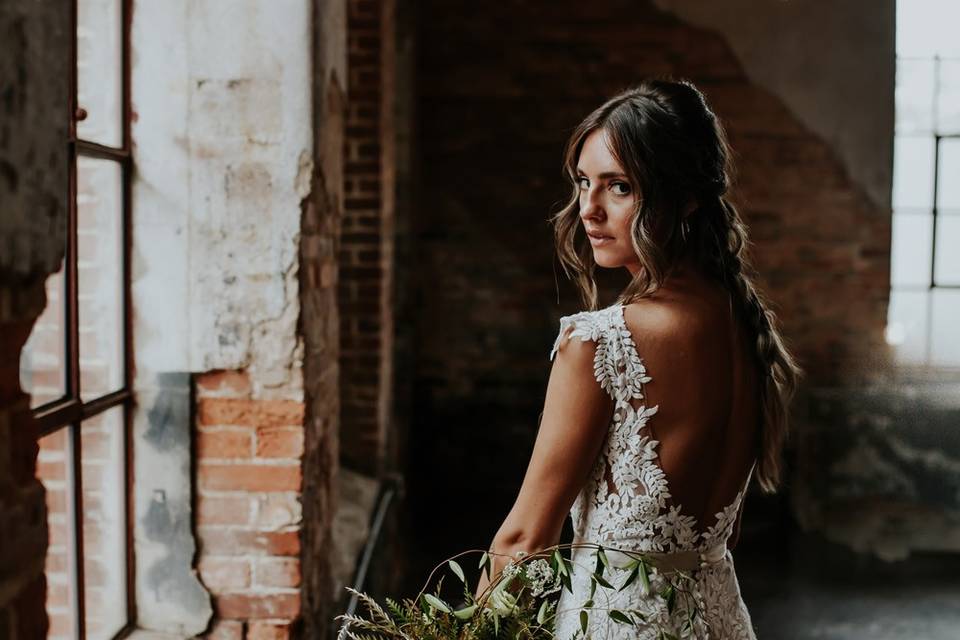 Bride posing with bouquet