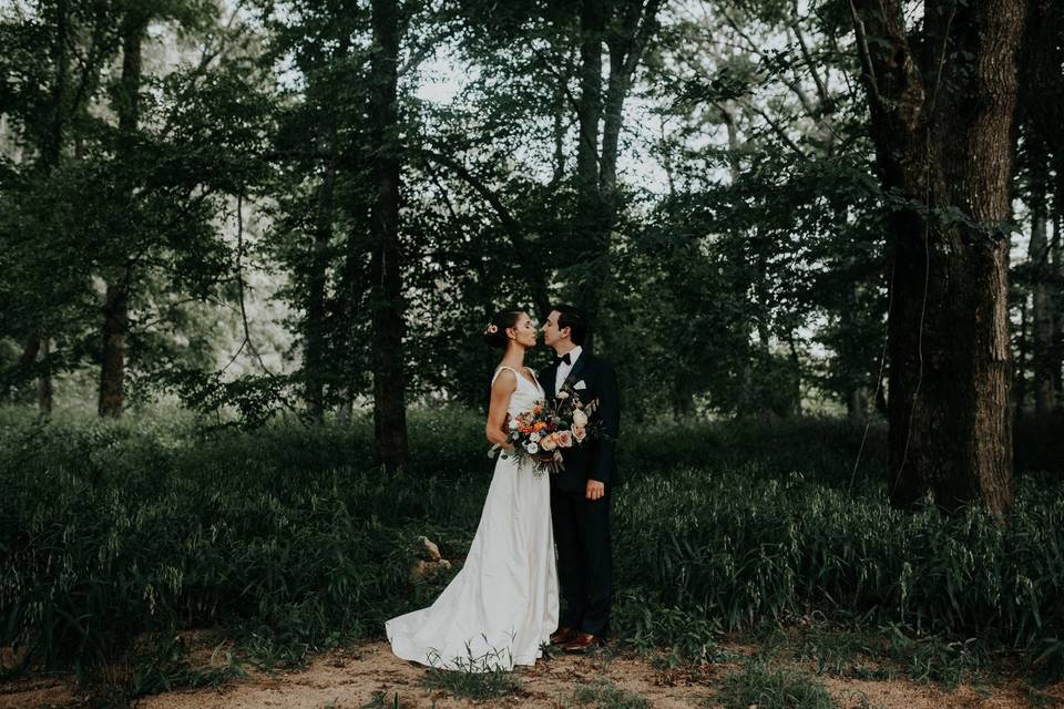 Couple posing in forest