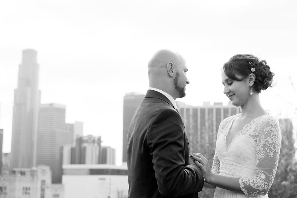 Newlywed couple and the city skyline