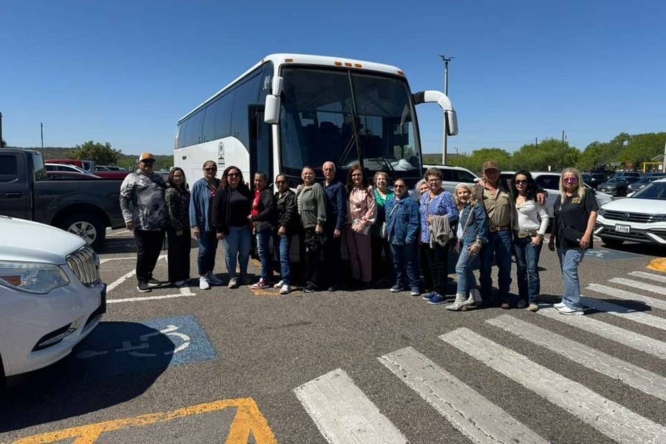 PeopleOutsideOfBus.jpg