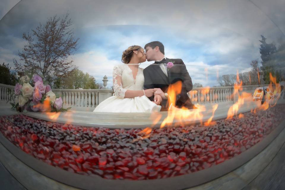 Bride and groom by the fire