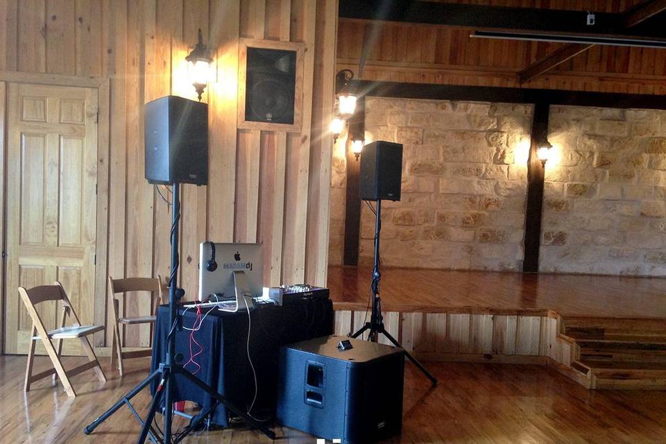 Package C is what you would choose if you do not need a light display. It includes 2 uplights, sound system, wireless mic, 2 DJ's, emcee services, and event planner.(Sound system will be either QSC or Bose speakers)This pic features the QSC system