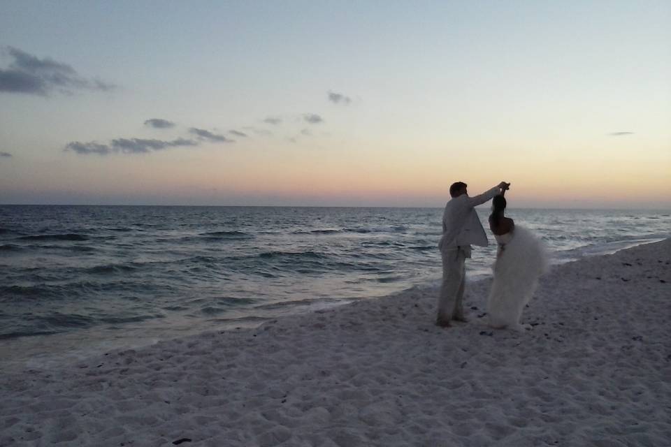 Sunset dance with his bride.