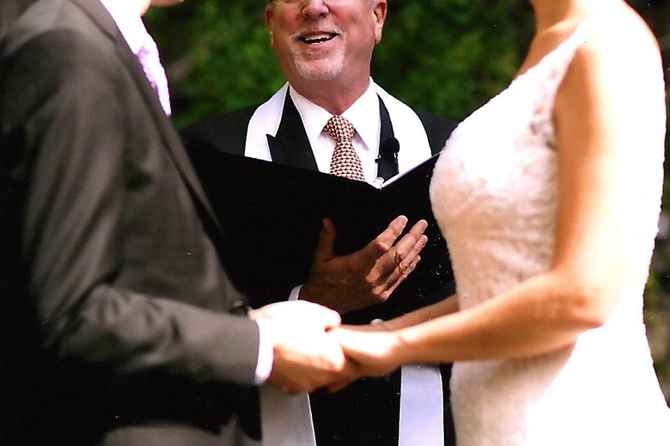 Rev Will officiating a wedding