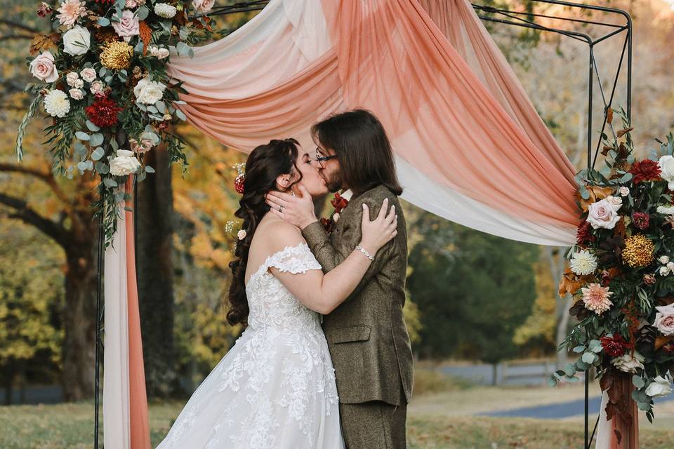 Bride and groom kiss