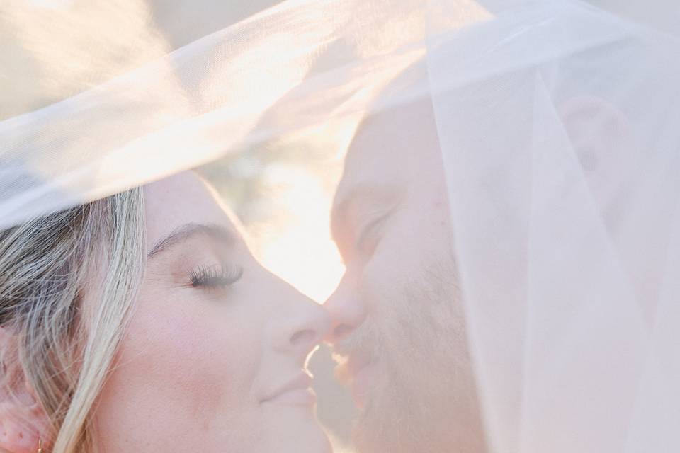 Bride and groom kiss