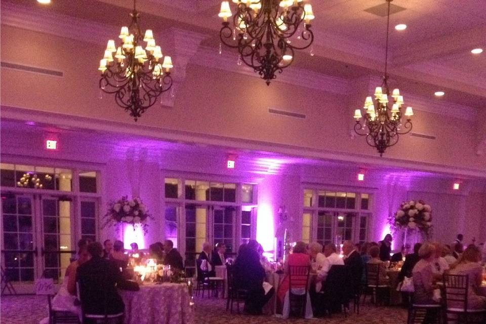 Purple uplighting at reception