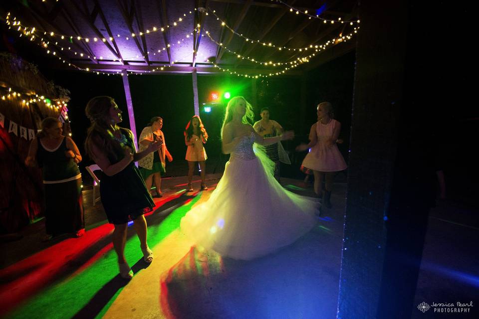 Dancing bride and guests